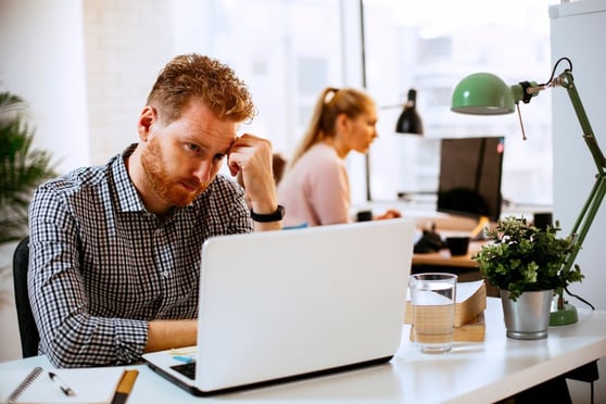 Worried businessman at office.