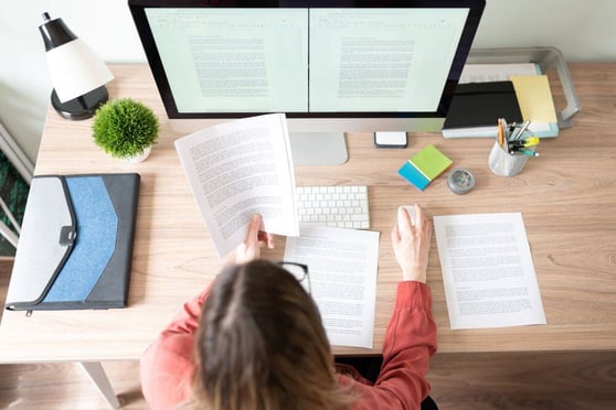 Writer working on a document.