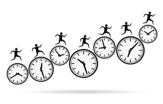 Graphic of a bunch of clocks, with people racing on top of them.