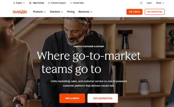 HubSpot customer platform hero promoting AI-powered tools for marketing, sales, and service teams.