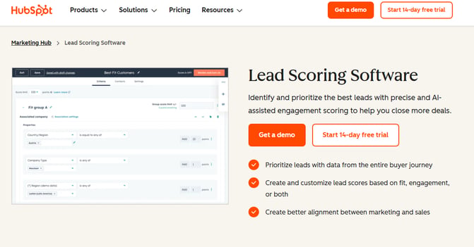HubSpot lead scoring software page showing AI-assisted scoring to prioritize and route high-quality leads.
